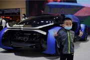 نمایشگاه ماشین در چین با صورت‌هایی پر از ماسک