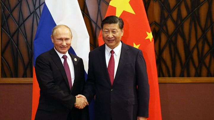 گفتگوی رؤسای جمهور روسیه و چین برای جایگزینی دلار با روبل و یوان