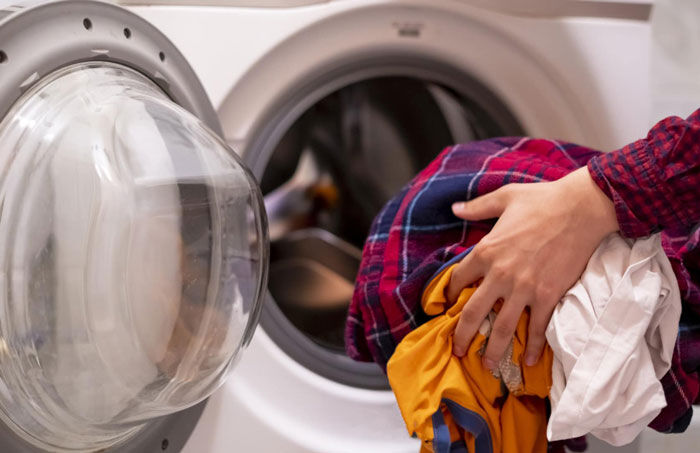 چرا ماشین لباسشویی لباس ها را آبکشی نمی کند؟